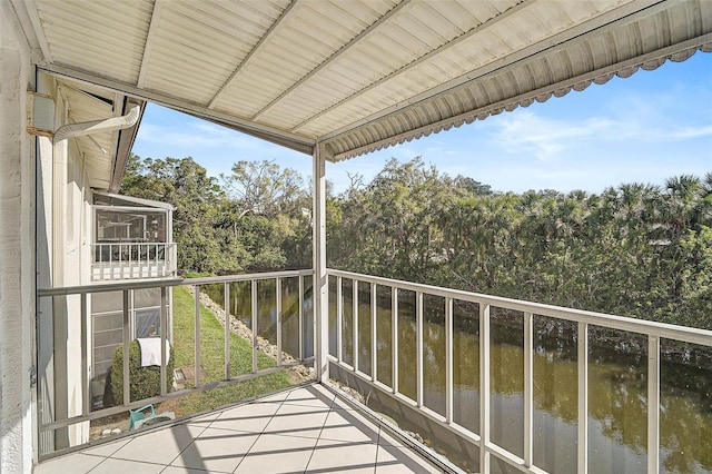 balcony featuring a water view