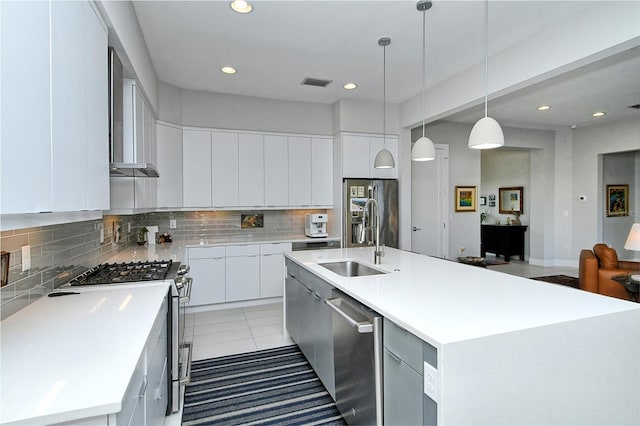 kitchen featuring visible vents, white cabinetry, appliances with stainless steel finishes, backsplash, and modern cabinets