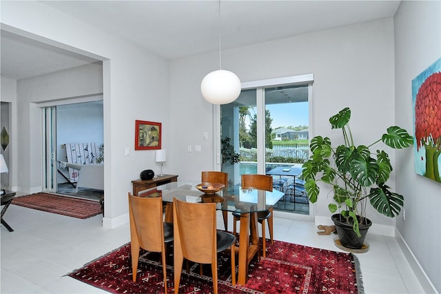 dining room with baseboards