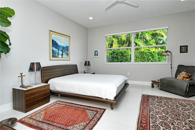 bedroom with ceiling fan, recessed lighting, tile patterned flooring, and baseboards