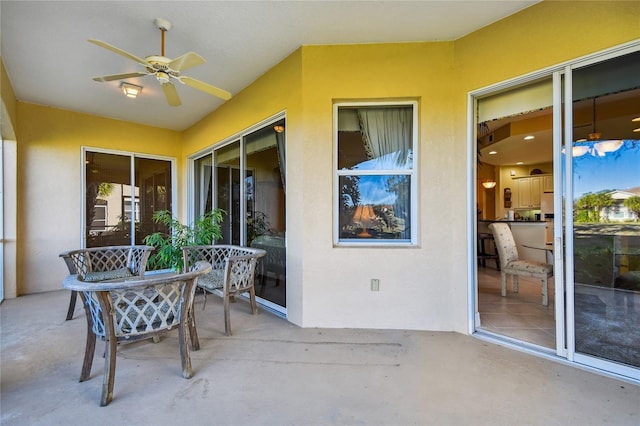 view of patio / terrace featuring ceiling fan