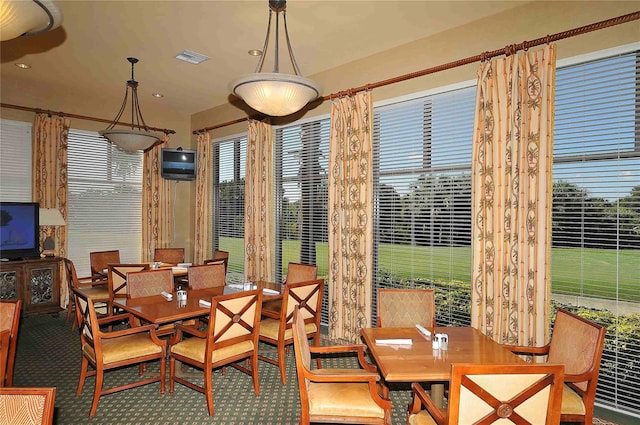 dining space featuring visible vents