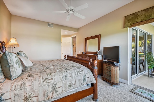 carpeted bedroom with access to exterior, visible vents, and ceiling fan