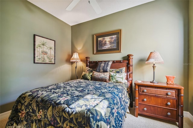 bedroom featuring light colored carpet and ceiling fan