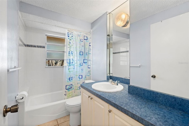 bathroom featuring a textured ceiling, shower / bath combination with curtain, vanity, and tile patterned floors