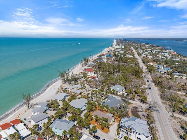 drone / aerial view featuring a water view and a residential view