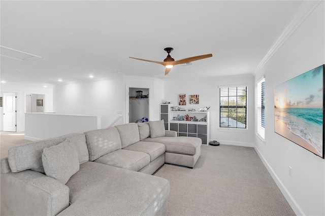 living area featuring light carpet, crown molding, baseboards, and ceiling fan