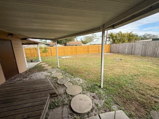 view of yard featuring a fenced backyard