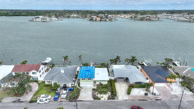 bird's eye view with a water view