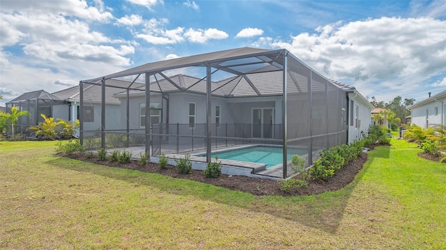 outdoor pool with a yard and glass enclosure