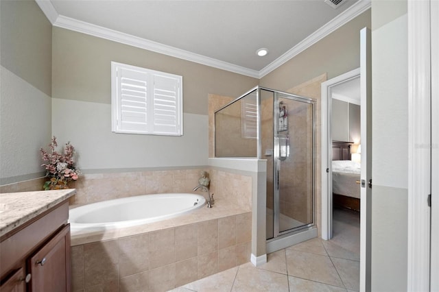 ensuite bathroom with a shower stall, a bath, and tile patterned floors