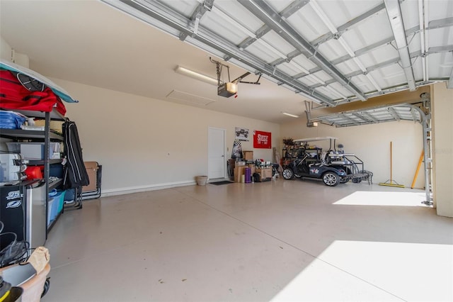 garage featuring a garage door opener