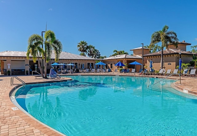 community pool featuring a patio area