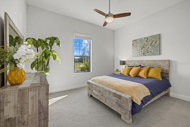 bedroom featuring ceiling fan, baseboards, and carpet flooring