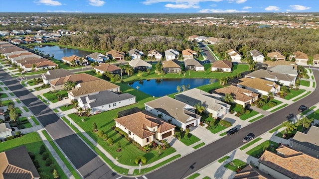 bird's eye view with a water view and a residential view