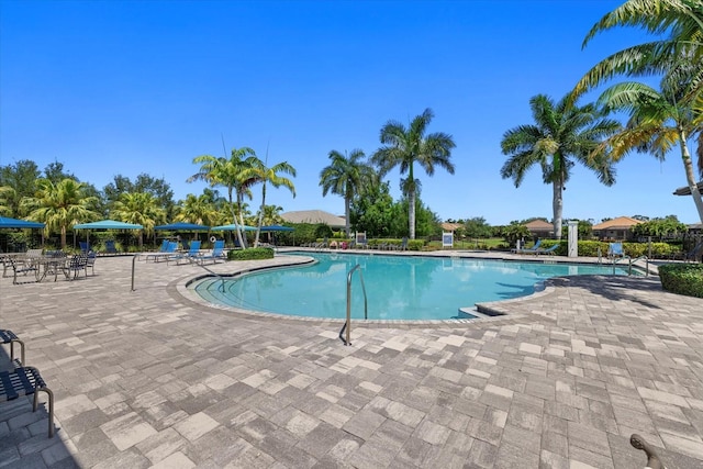 pool with a patio