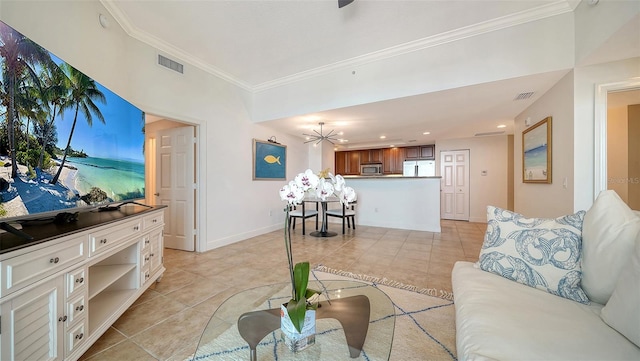 living room with light tile patterned floors, visible vents, baseboards, and ornamental molding