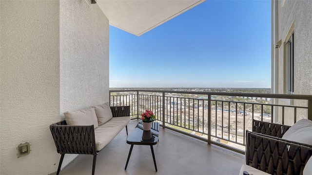 balcony with an outdoor hangout area