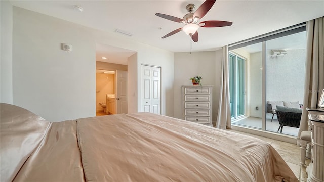 bedroom with visible vents, a ceiling fan, ensuite bathroom, and access to outside