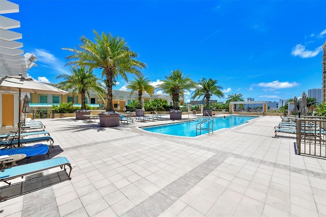 community pool featuring a patio area