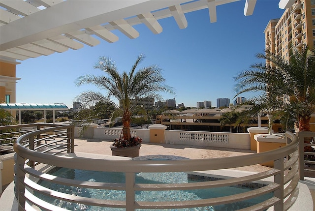 view of patio / terrace with a city view and a pergola