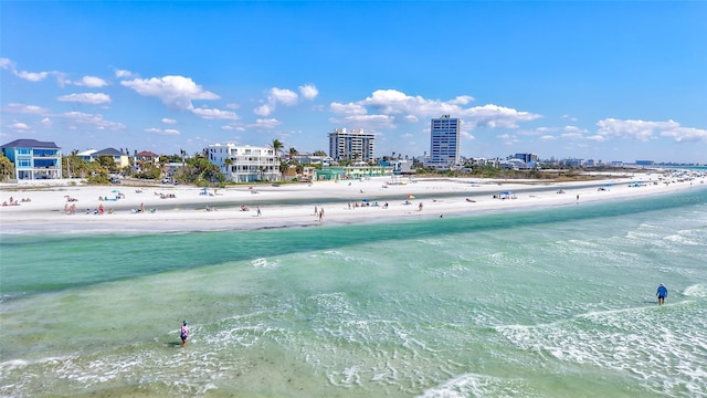 property view of water featuring a beach view and a city view