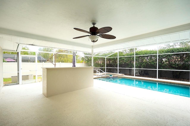 view of pool featuring a ceiling fan, a lanai, fence, and a patio