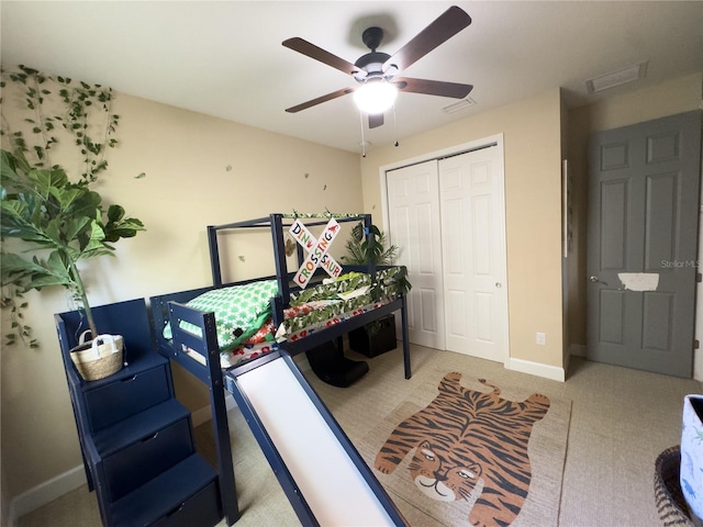 interior space with a ceiling fan, visible vents, and baseboards