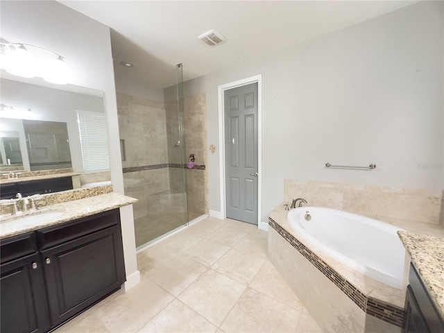 full bathroom featuring visible vents, a stall shower, vanity, tile patterned flooring, and a bath