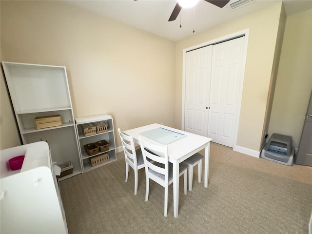 game room with carpet floors, baseboards, visible vents, and a ceiling fan