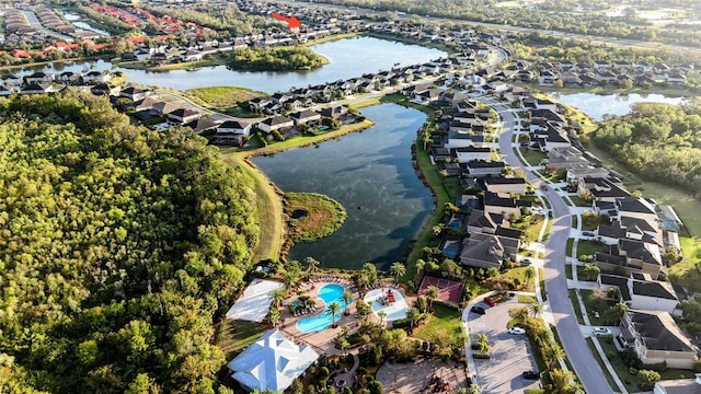 aerial view featuring a residential view and a water view