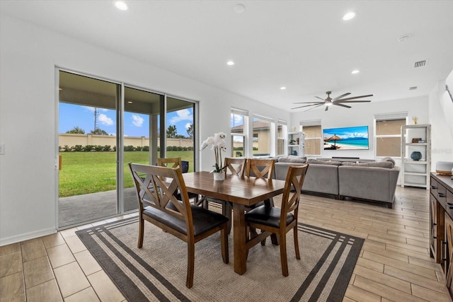 dining area with a ceiling fan, recessed lighting, baseboards, and light wood finished floors