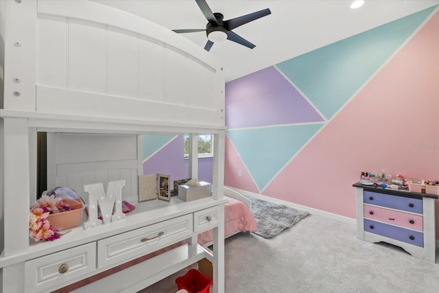 carpeted bedroom featuring baseboards