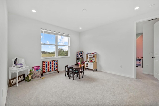 recreation room featuring carpet, baseboards, and recessed lighting