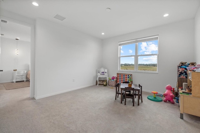 rec room with carpet floors, baseboards, and recessed lighting