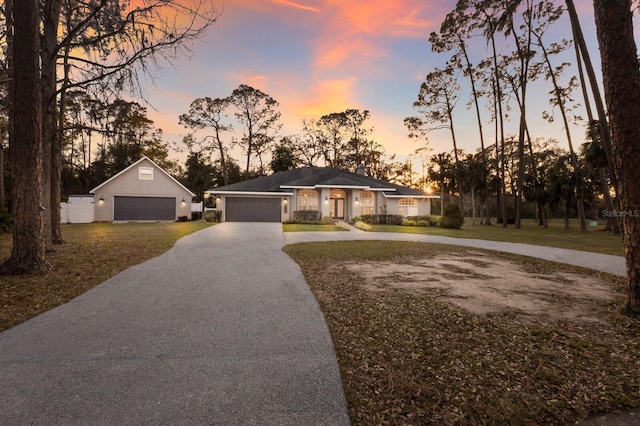 view of front of house featuring a garage and driveway