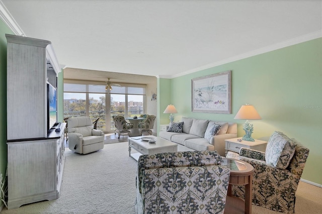 carpeted living room with baseboards and ornamental molding