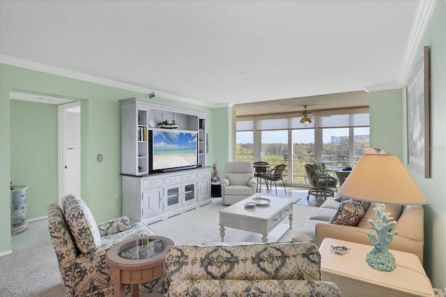 carpeted living area with ornamental molding and baseboards