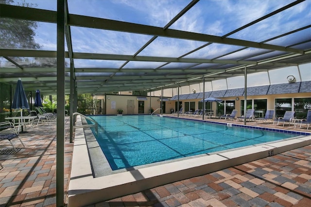 community pool with a patio area