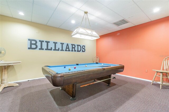 recreation room featuring a paneled ceiling, baseboards, visible vents, and carpet flooring