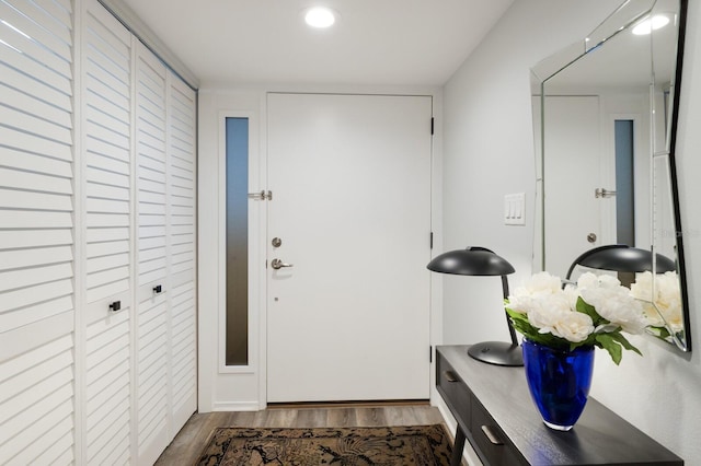 entrance foyer with dark wood-style floors