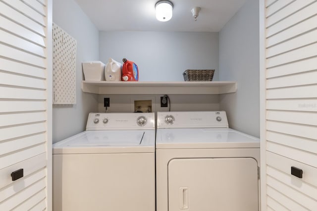 laundry area featuring washing machine and dryer and laundry area