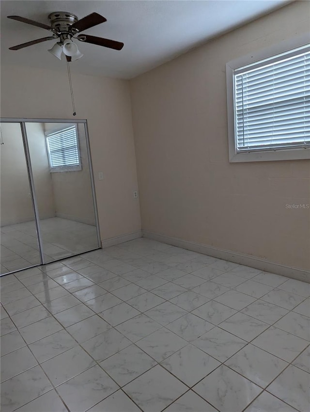 1807 48th Ave W, Bradenton, FL 34207 - empty room with ceiling fan and baseboards