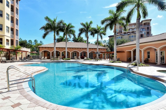 community pool with a patio