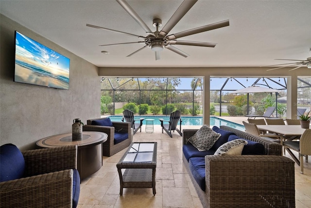 exterior space with a pool, a wealth of natural light, and ceiling fan