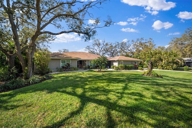 exterior space featuring a front lawn