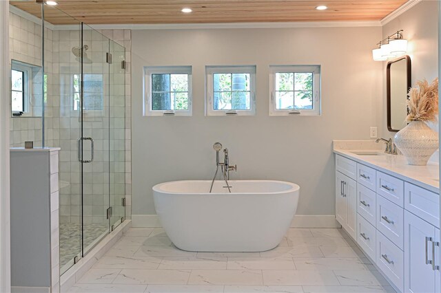 bathroom with marble finish floor, double vanity, ornamental molding, a sink, and a shower stall