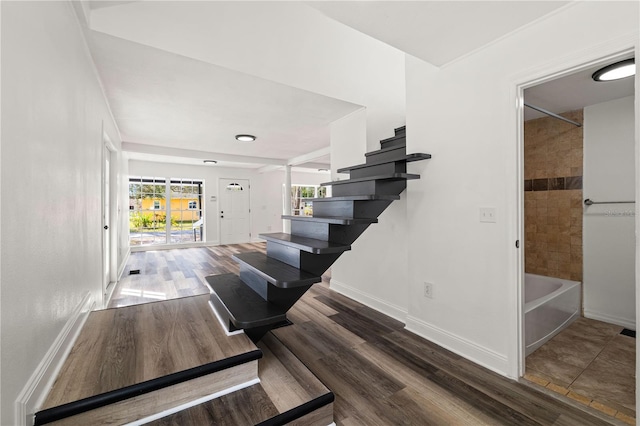 1397 43rd St, Sarasota, FL 34234 - stairway featuring wood finished floors