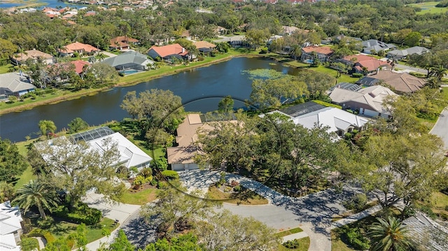 birds eye view of property featuring a residential view and a water view