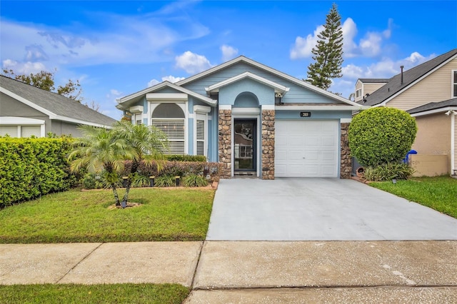 view of front of house featuring an attached garage, concrete driveway, stone siding, stucco siding, and a front lawn